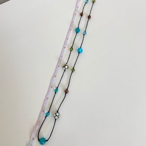 Statement bead and cord Necklace. Teal and green